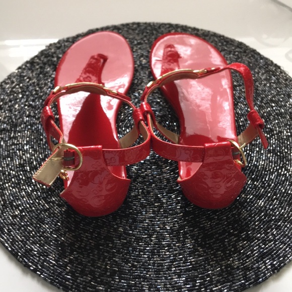 red guess flip flops